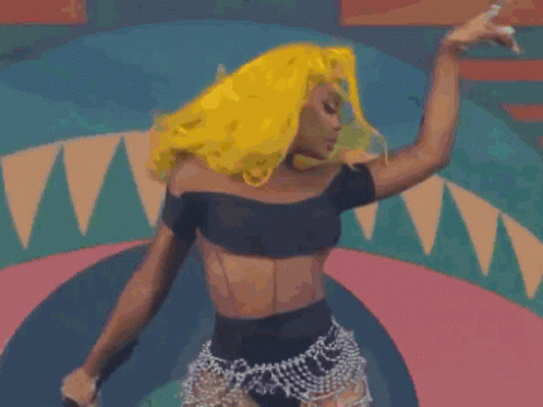 Woman With Bright Yellow Hair Dancing