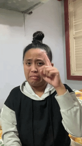 Woman With Bun Making Face