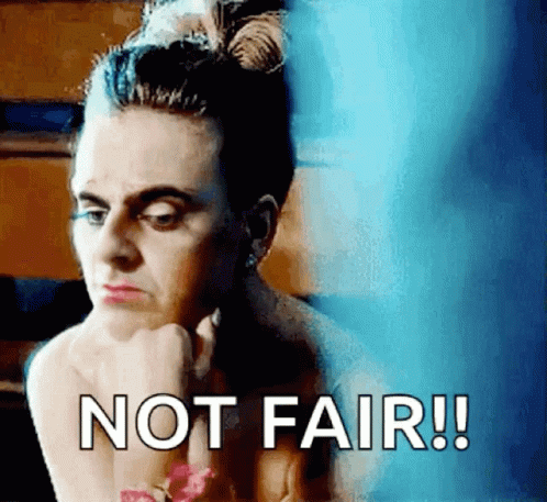 Woman With Bun Saying Not Fair GIF