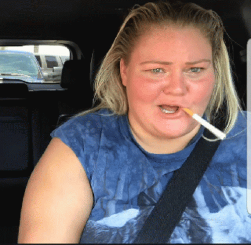 Woman With Cigarette In Blue Shirt GIF