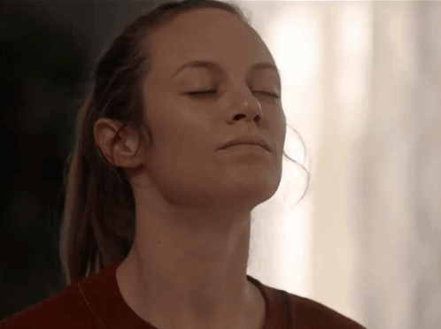 Woman With Closed Eyes and Ponytail