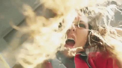 Woman With Crazy Hair Loves It So Much GIF