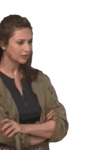 Woman With Crossed Arms in Green Cardigan