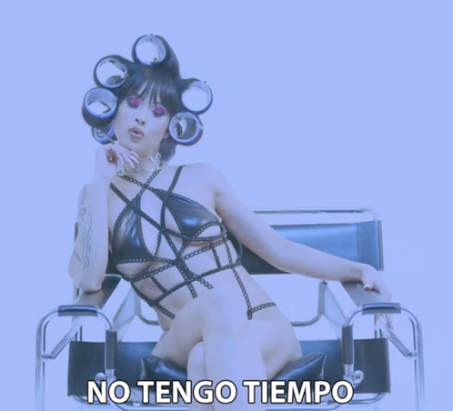 Woman With Curlers Sitting in Chair Saying No Tengo Tiempo