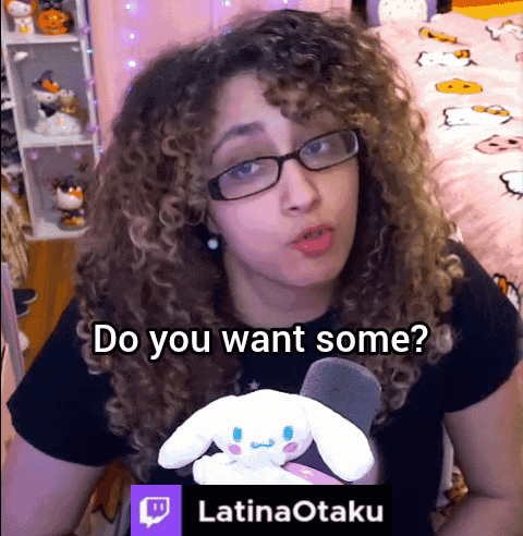 Woman With Curly Hair And Glasses Holding Stuffed Animal Says Do You Want Some GIF