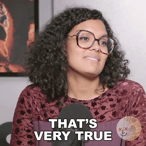 Woman with Curly Hair and Glasses Says That's Very True