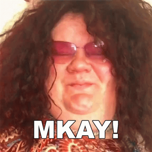 Woman With Curly Hair And Pink Sunglasses Says Mkay GIF