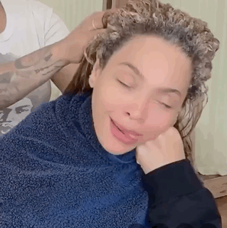 Woman with Curly Hair Getting Hair Dyed