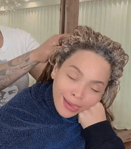 Woman with Curly Hair Getting Hair Dyed