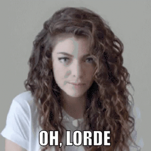 Woman With Curly Hair In White Shirt Saying Oh Lorde GIF