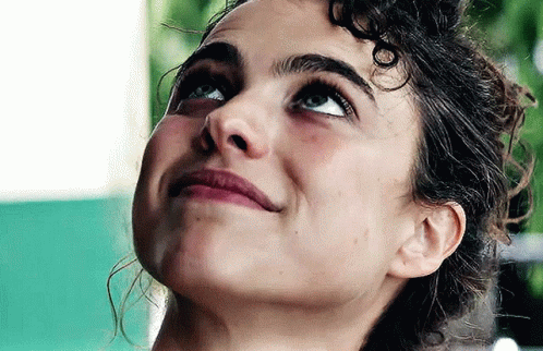 Woman with Curly Hair Looking Up
