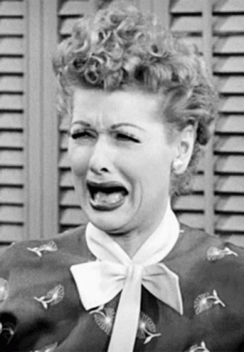 Woman with Curly Hair Making Funny Face