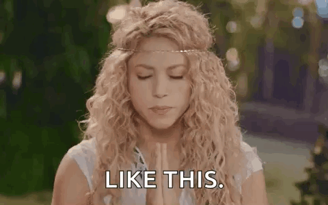 Woman With Curly Hair Praying Eyes Closed Saying Like This GIF