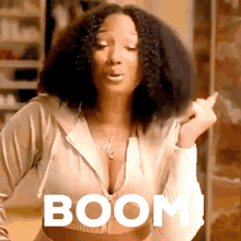 Woman with Curly Hair Saying Boom