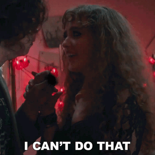 Woman With Curly Hair Says I Can't Do That Holding Man's Hand