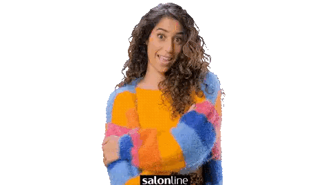 Woman with Curly Hair Wearing Salonline Sweater