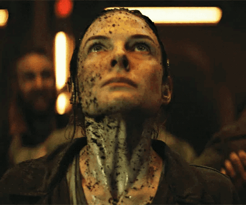 Woman With Dirt on Face Looking Up