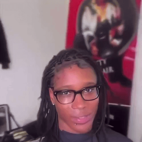Woman With Dreadlocks And Glasses Making Funny Face GIF