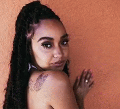 Woman with Dreadlocks and Shoulder Tattoo