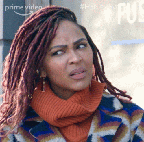 Woman with Dreadlocks Wearing Prime Video Sweater and Coat