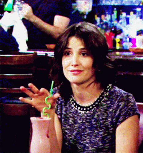 Woman with Drink and Green Straw