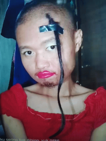 Woman With Duct Tape On Eyebrows And Lipstick GIF