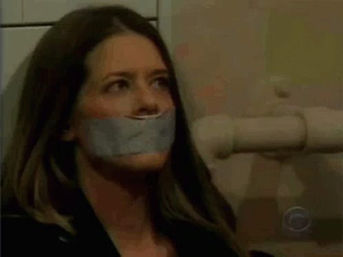 Woman With Duct Tape on Mouth