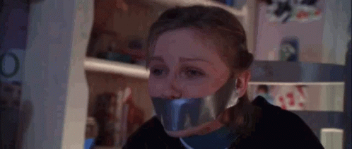 Woman With Duct Tape On Mouth GIF