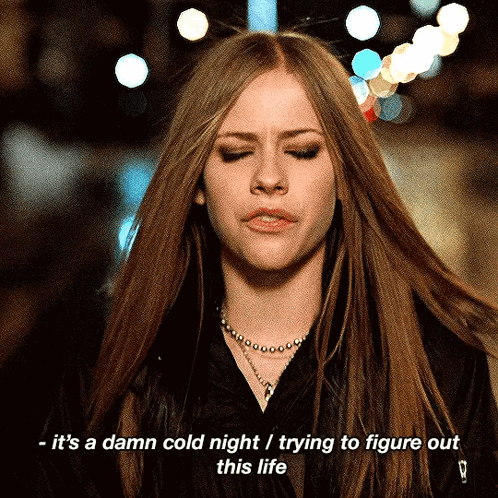 Woman with Eyes Closed and Cold Night Words