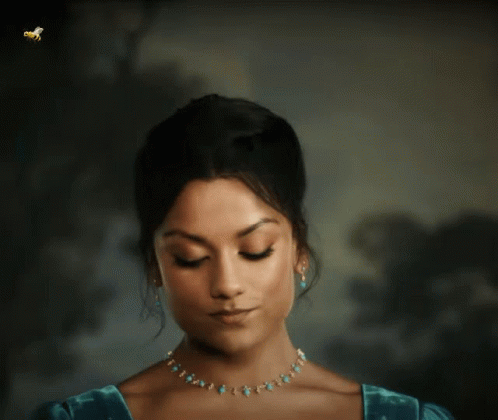 Woman With Eyes Closed and Turquoise Necklace and Earrings