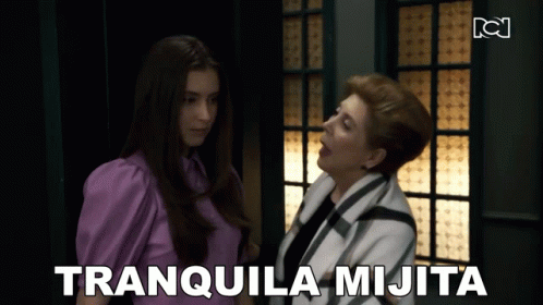 Woman With Eyes Closed Looking at Another Woman