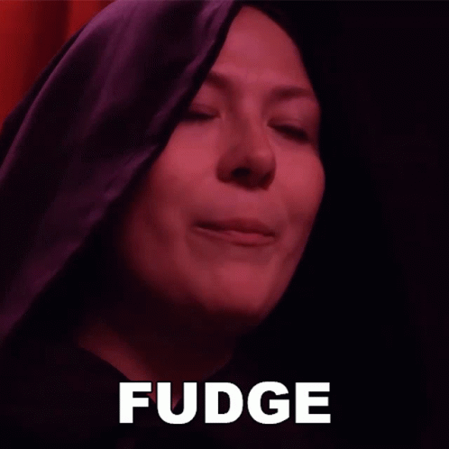 Woman With Eyes Closed Saying Fudge GIF