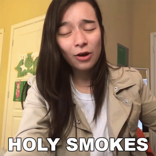 Woman With Eyes Closed Saying Holy Smoke