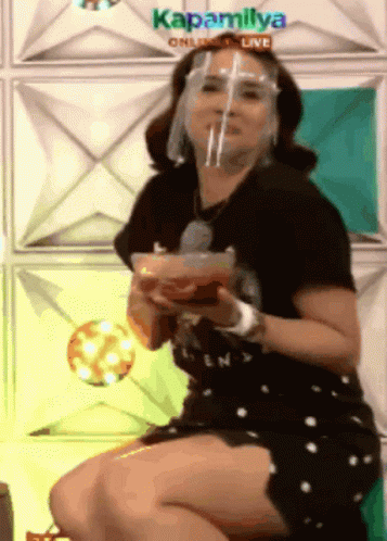 Woman With Face Shield Holding Food Bowl Kapamilya