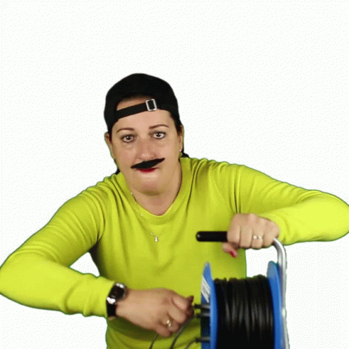 Woman With Fake Mustache Holding Wires