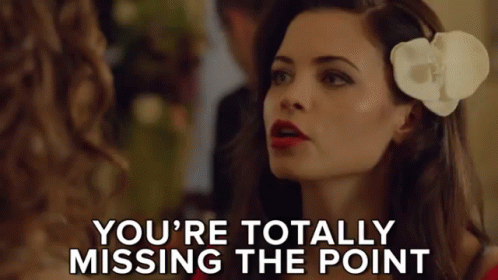 Woman With Flower Saying You're Totally Missing the Point