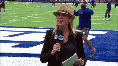 Woman With Fox Logo on Hat