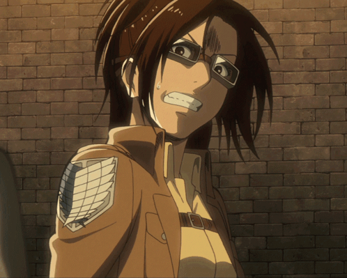 Woman With Glasses And Brick Wall GIF