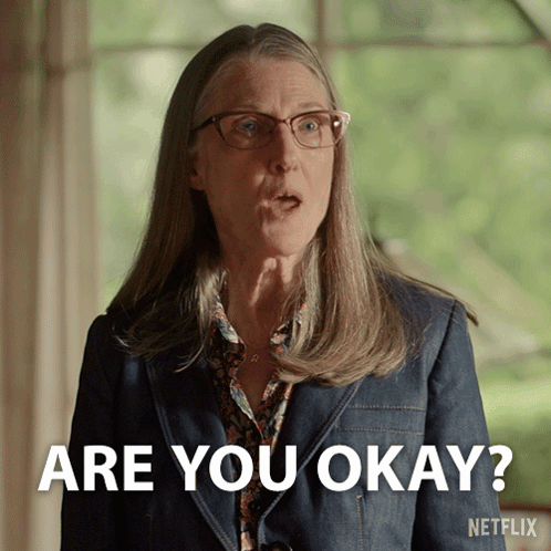 Woman With Glasses And Denim Jacket Saying Are You Okay GIF
