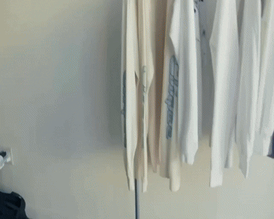 Woman With Glasses And Dreadlocks Getting Hair Done At Salon GIF