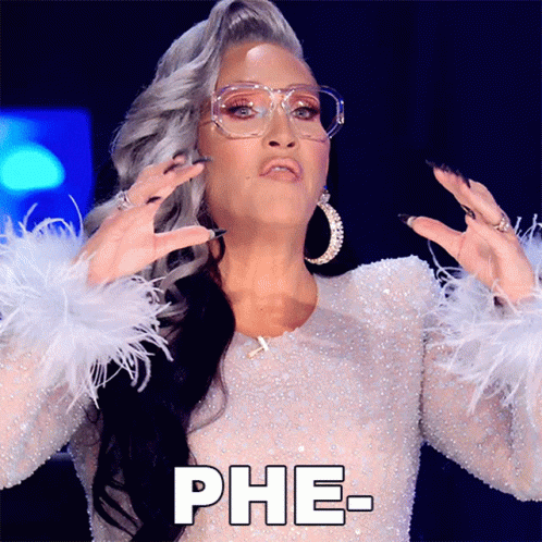 Woman with Glasses and Feathered Sleeves Saying Phe