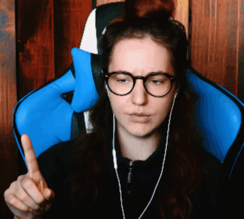 Woman with Glasses and Headphones Giving Middle Finger