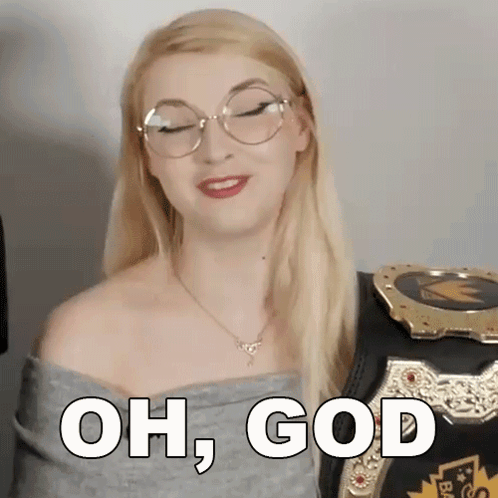 Woman With Glasses and Necklace Next to Wrestling Belt Saying Oh God