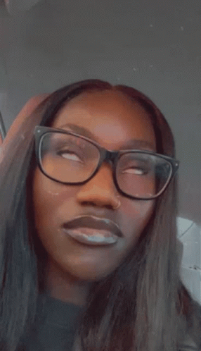 Woman With Glasses and Nose Ring