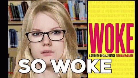 Woman With Glasses in Front of Book Called Woke