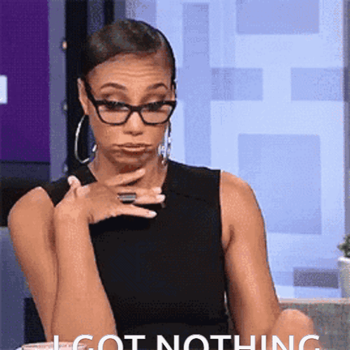 Woman with Glasses Making Funny Face Saying I Got Nothing