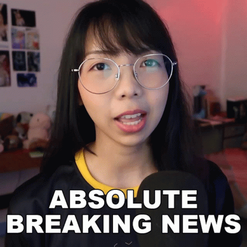 Woman With Glasses Saying Absolute Breaking News