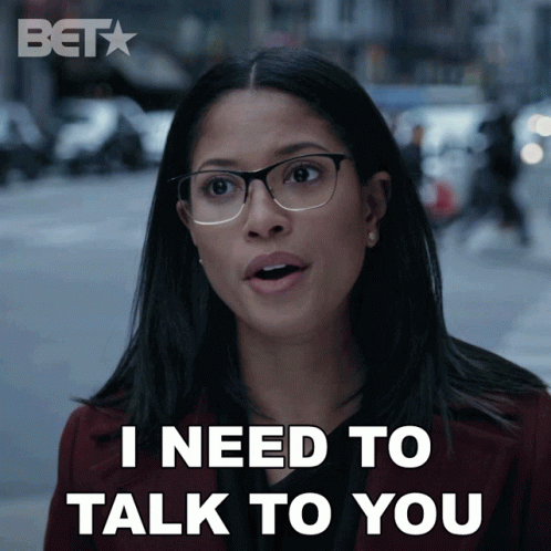 Woman with Glasses Saying I Need to Talk