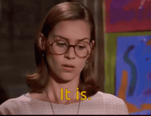 Woman with Glasses Saying It