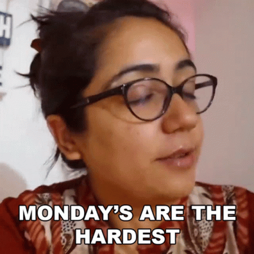Woman With Glasses Saying Monday's Are the Hardest